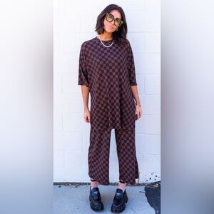 Dressed in LALA Lex Ribbed Checkerboard Playsuit in Black/Mocha size L